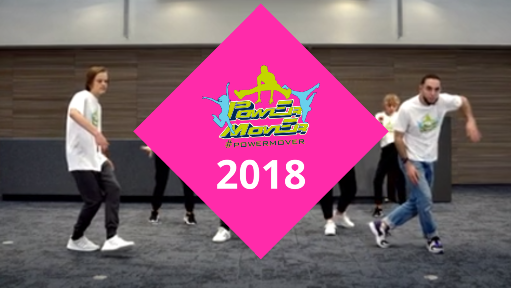 Kuvakaappaus vuoden 2022 videosta. Päällä pinkki neliö, jossa Power Mover logo sekä vuosiluku 2018.